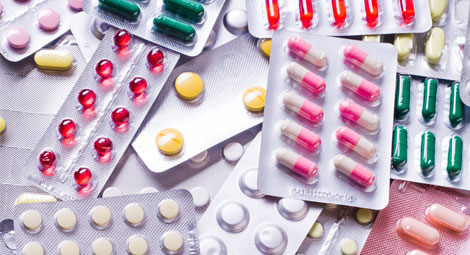 A pile of medication of different types and colours